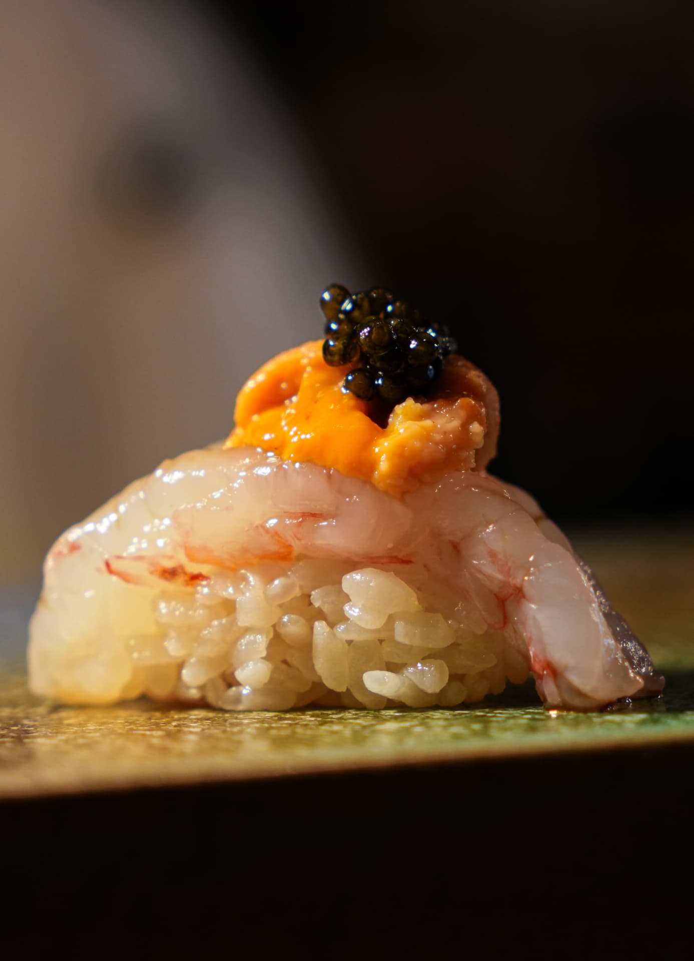 Sweet shrimp nigiri topped with uni and caviar